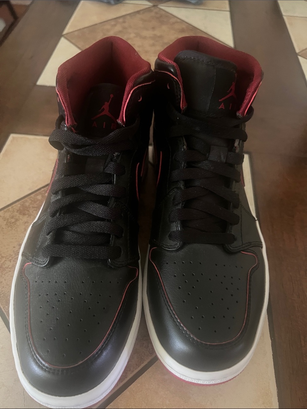 Jordan Black and Red Mid/High-Top Sneakers